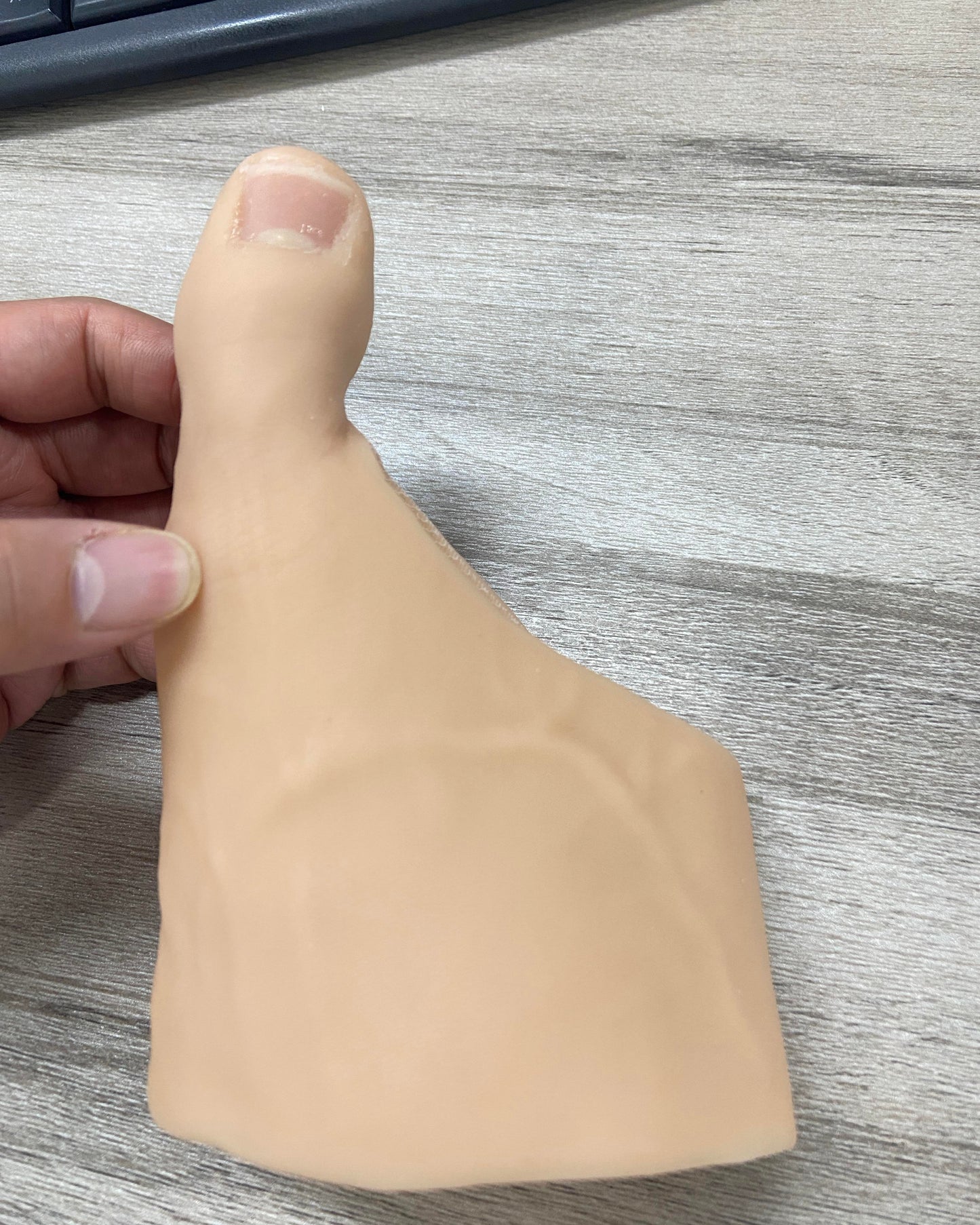 Attached prosthetic toe